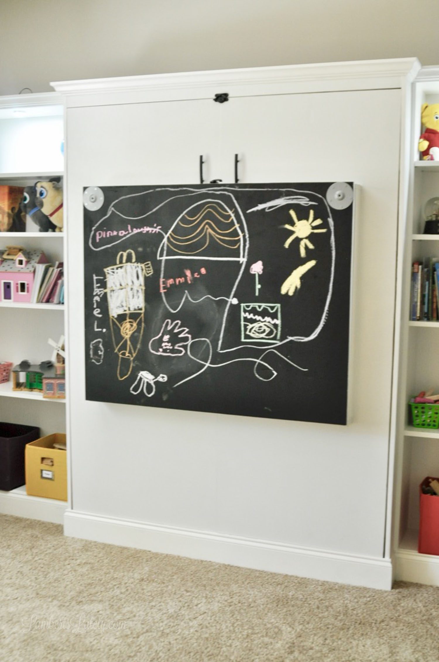 fold-out desk folded in; chalkboard on underside of desktop when folded in