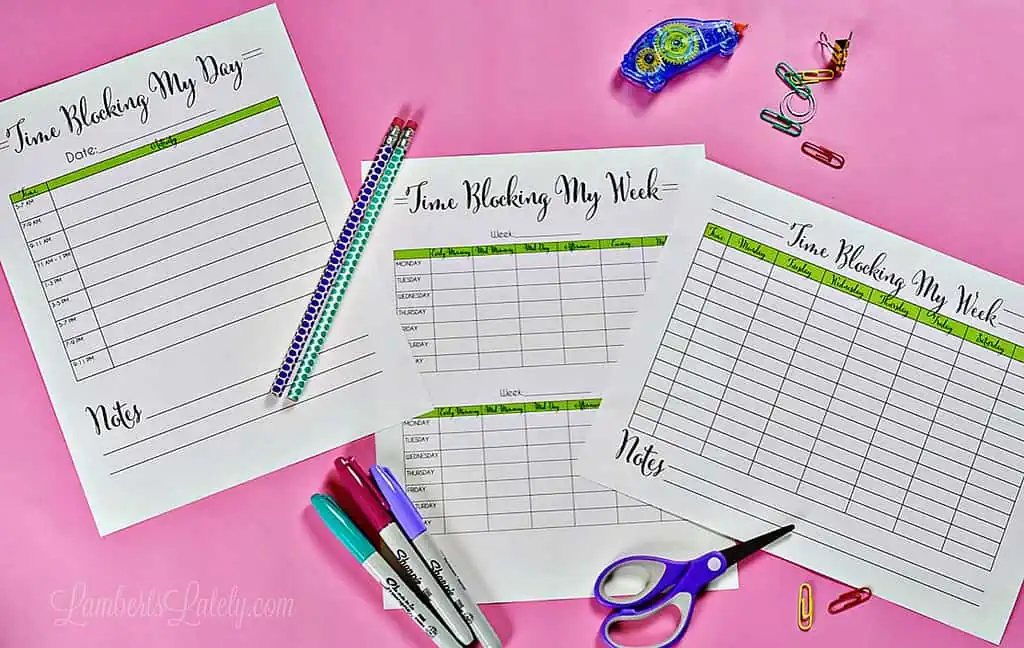 3 time blocking printables on a pink desk.