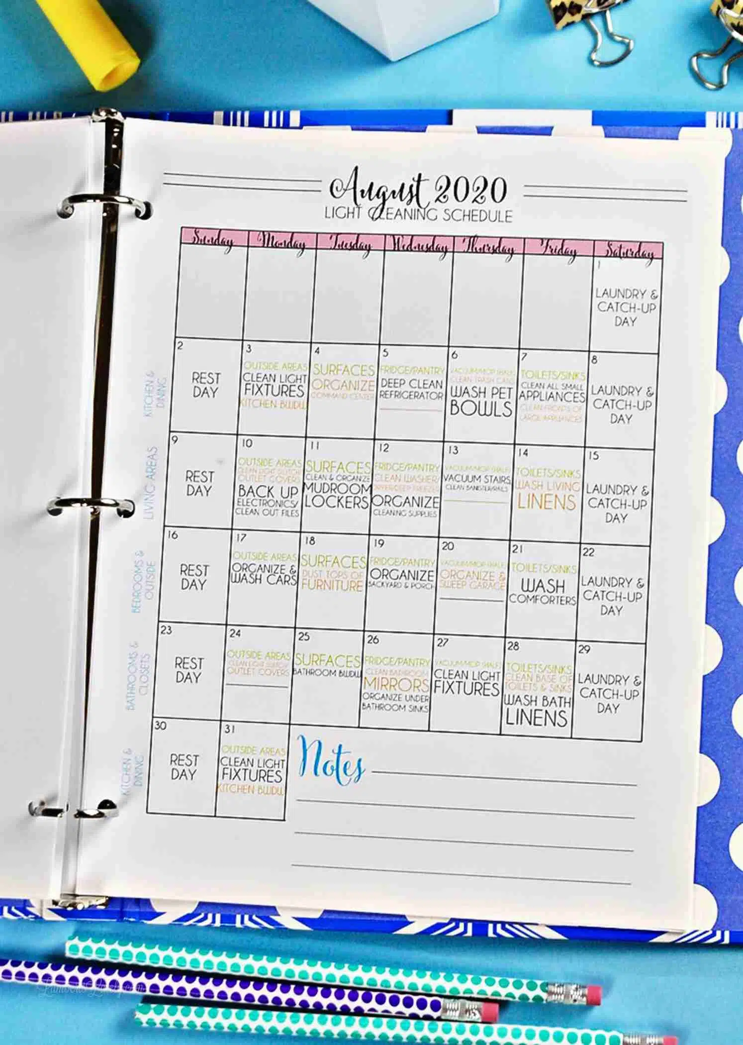 august 2020 cleaning calendar in a notebook