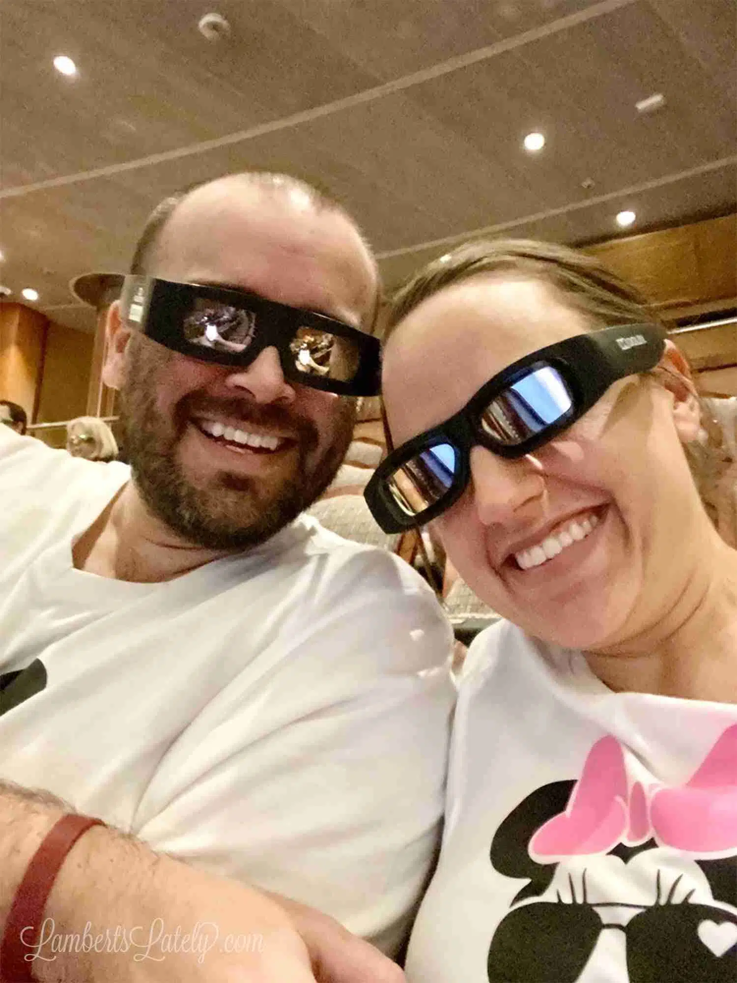 wearing 3d glasses at movie theater on the ship.