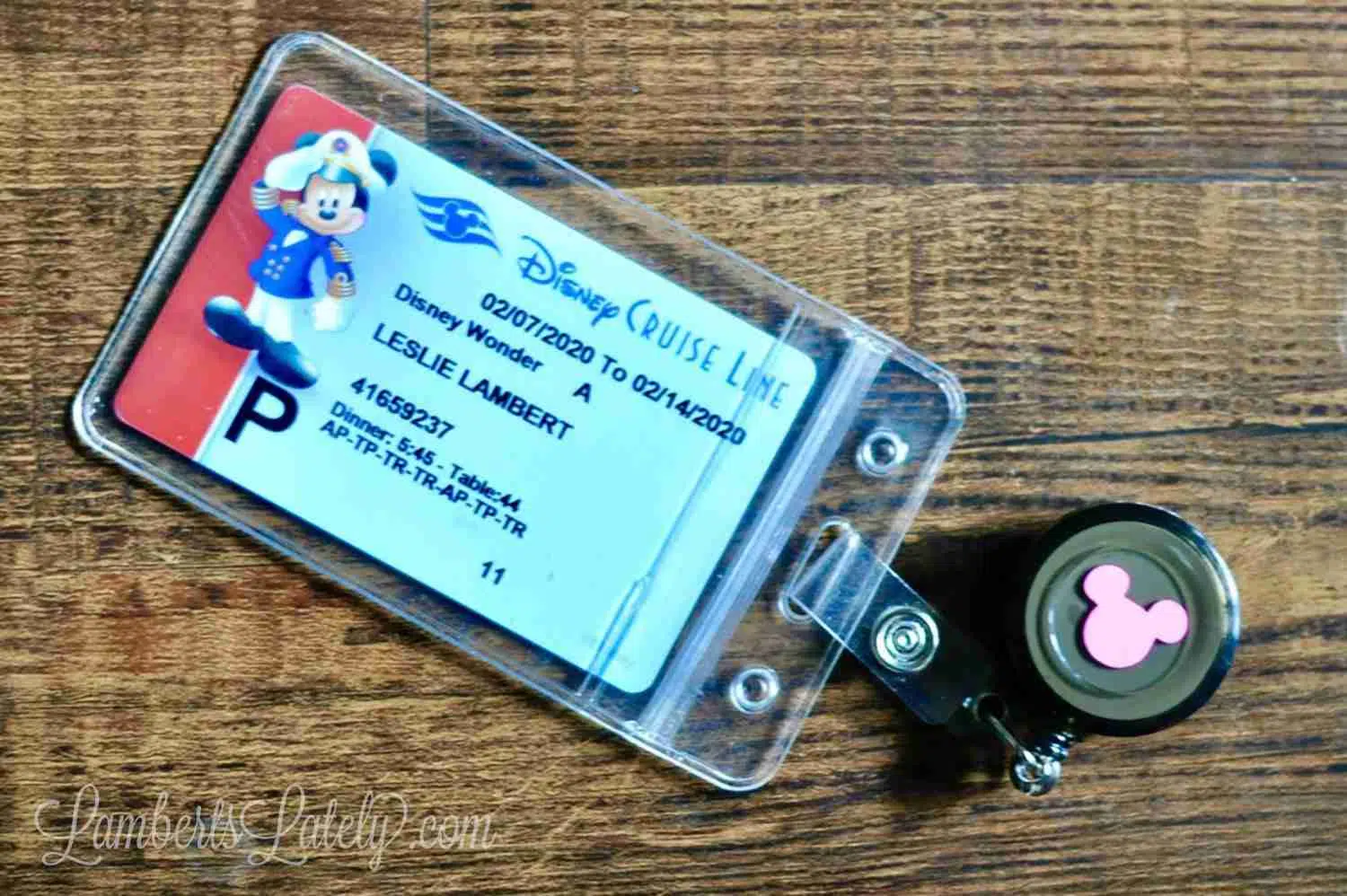retractable card holder holding a disney cruise id.