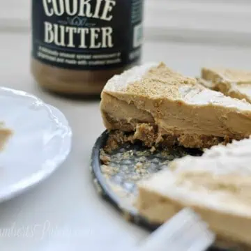 slice of cookie butter pie missing from the whole pie.