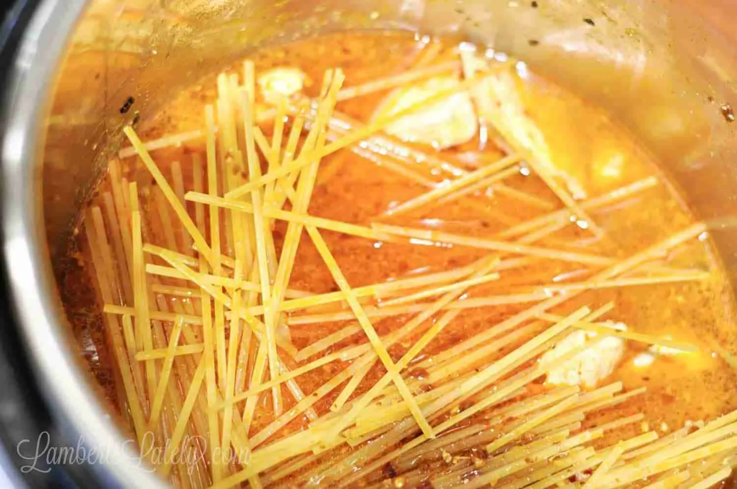 uncooked pasta added to instant pot