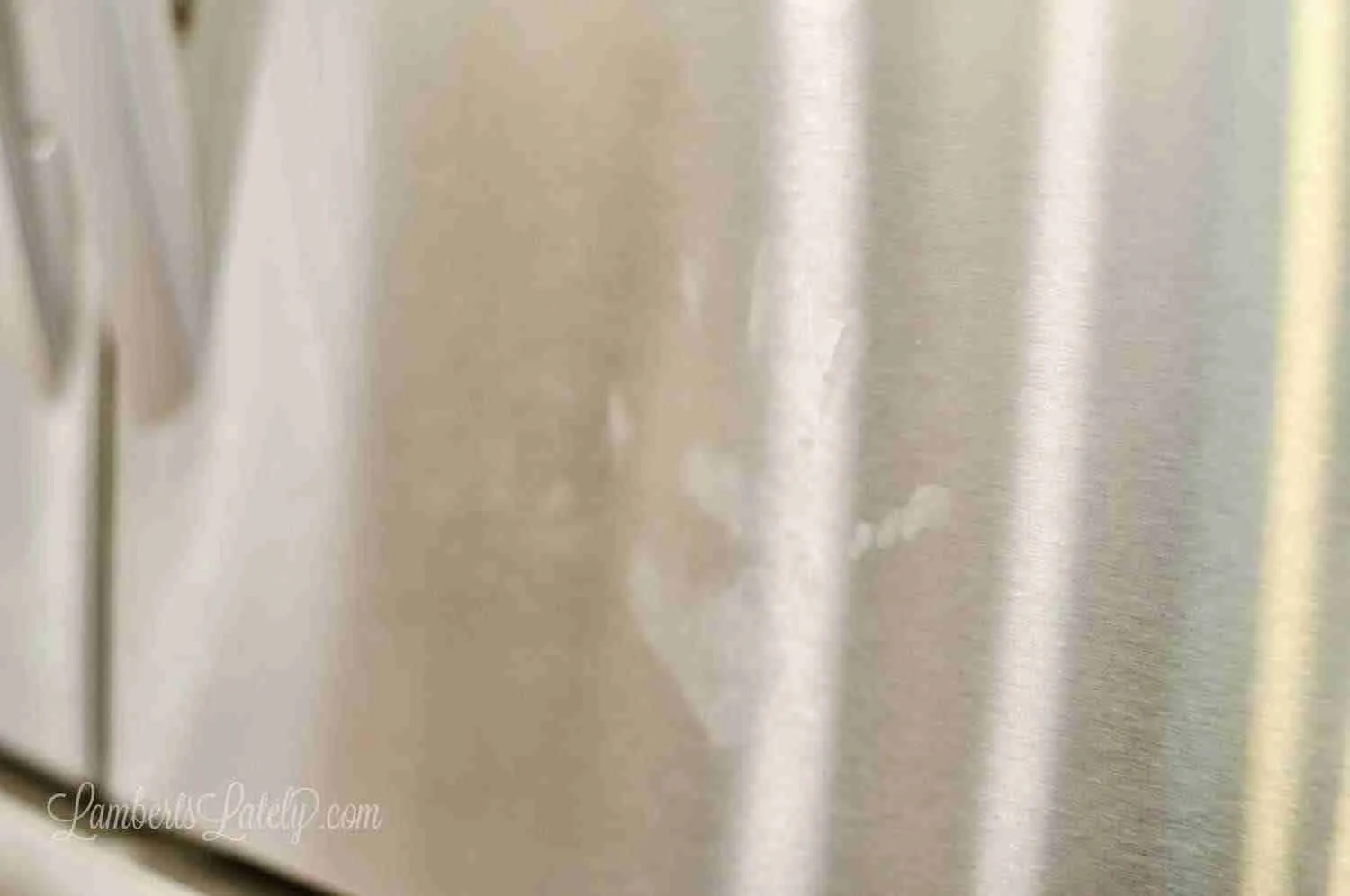 handprint on stainless steel refrigerator
