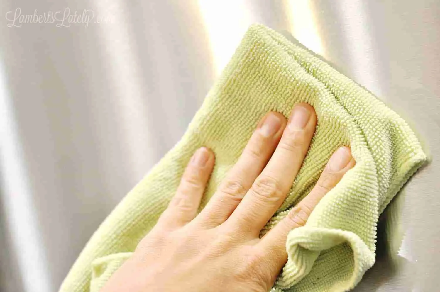 using a microfiber cloth on stainless steel