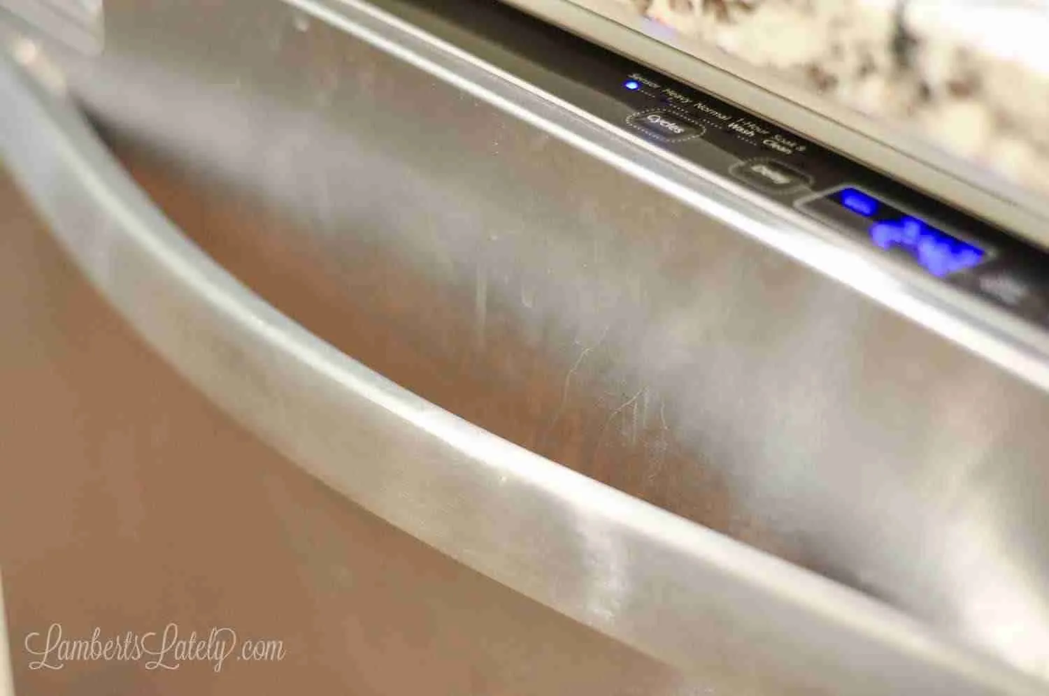 smudges and scratches on a stainless steel dishwasher