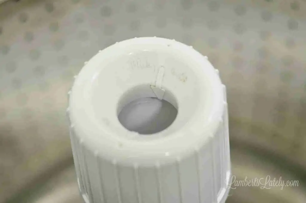 dirty fabric softener dispenser on washing machine.