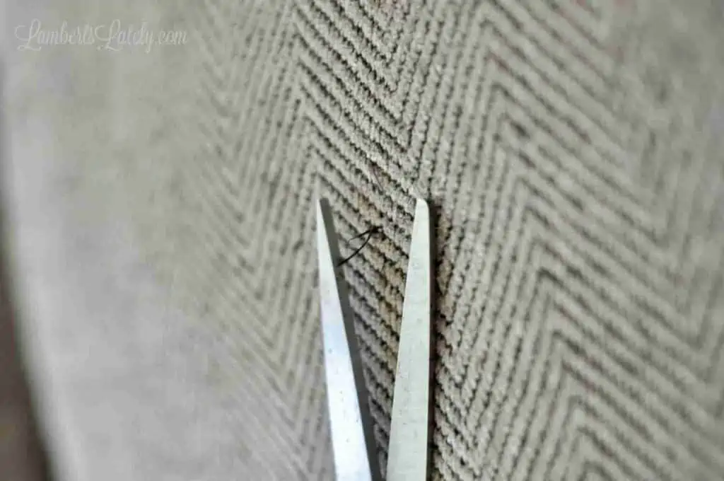 cutting strings off of a couch