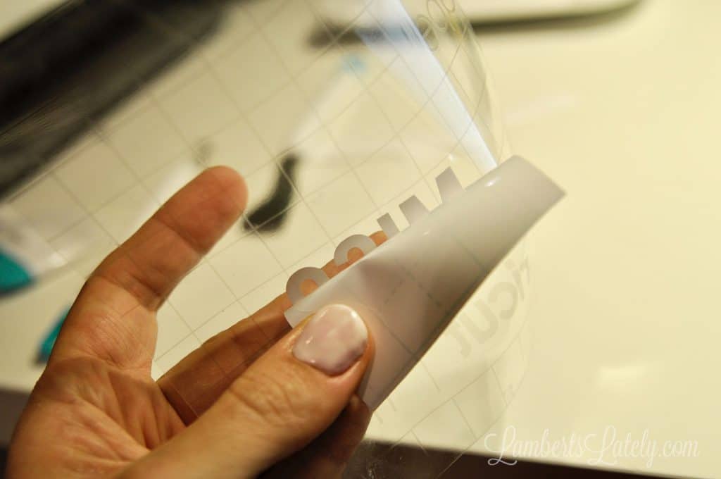peeling backing off of label on transfer paper
