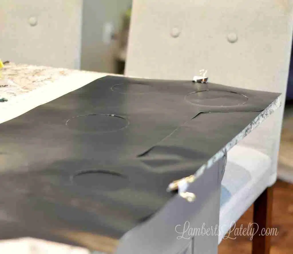 two pieces of oven liner fastened together