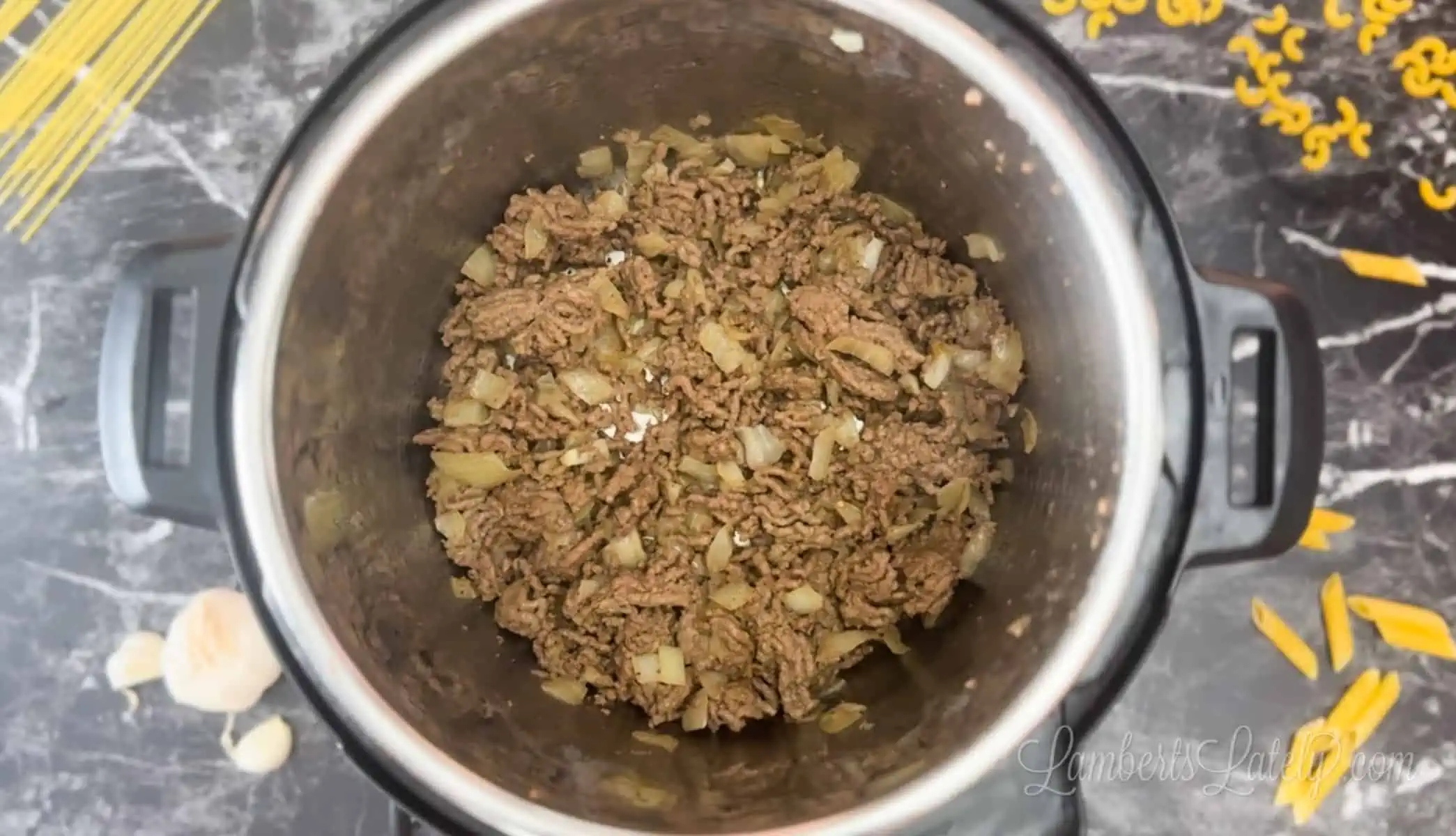 cooking ground beef and onion in an instant pot.