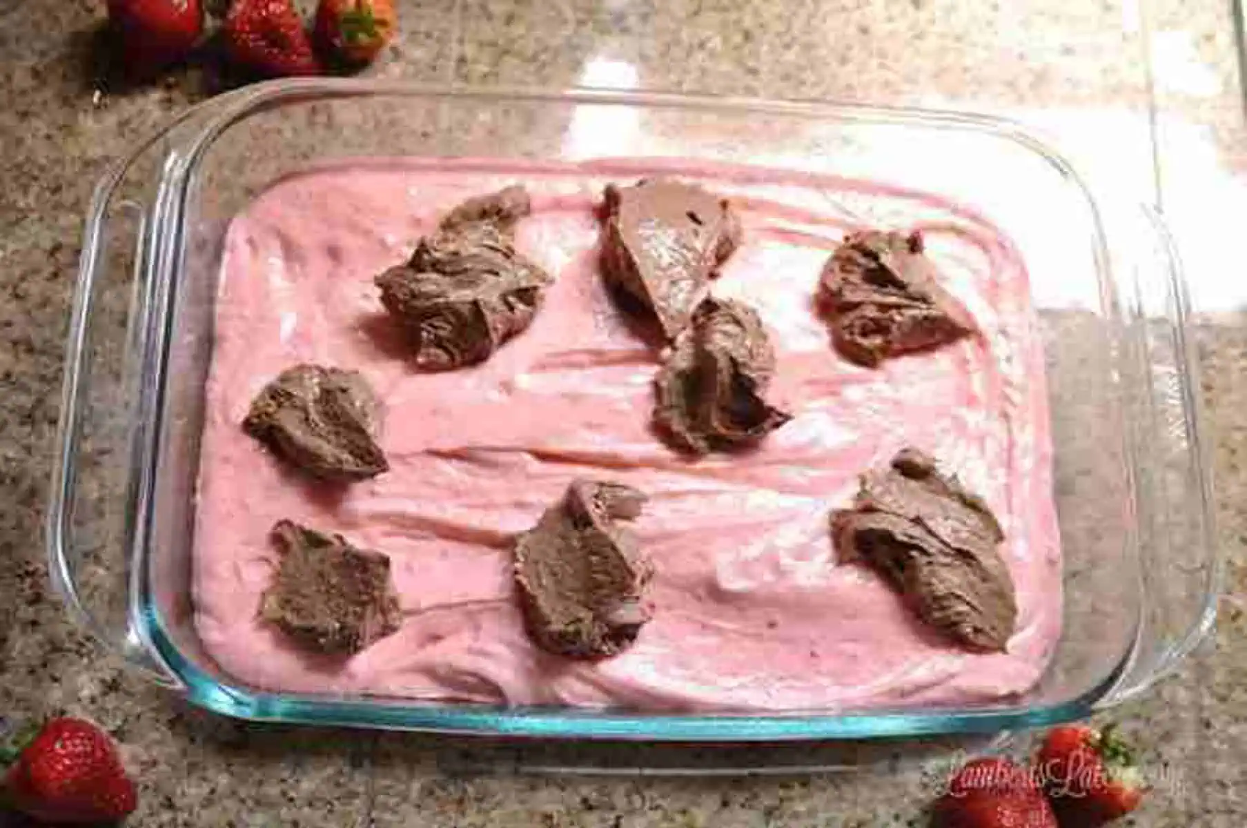chocolate mixture spooned over cake batter.
