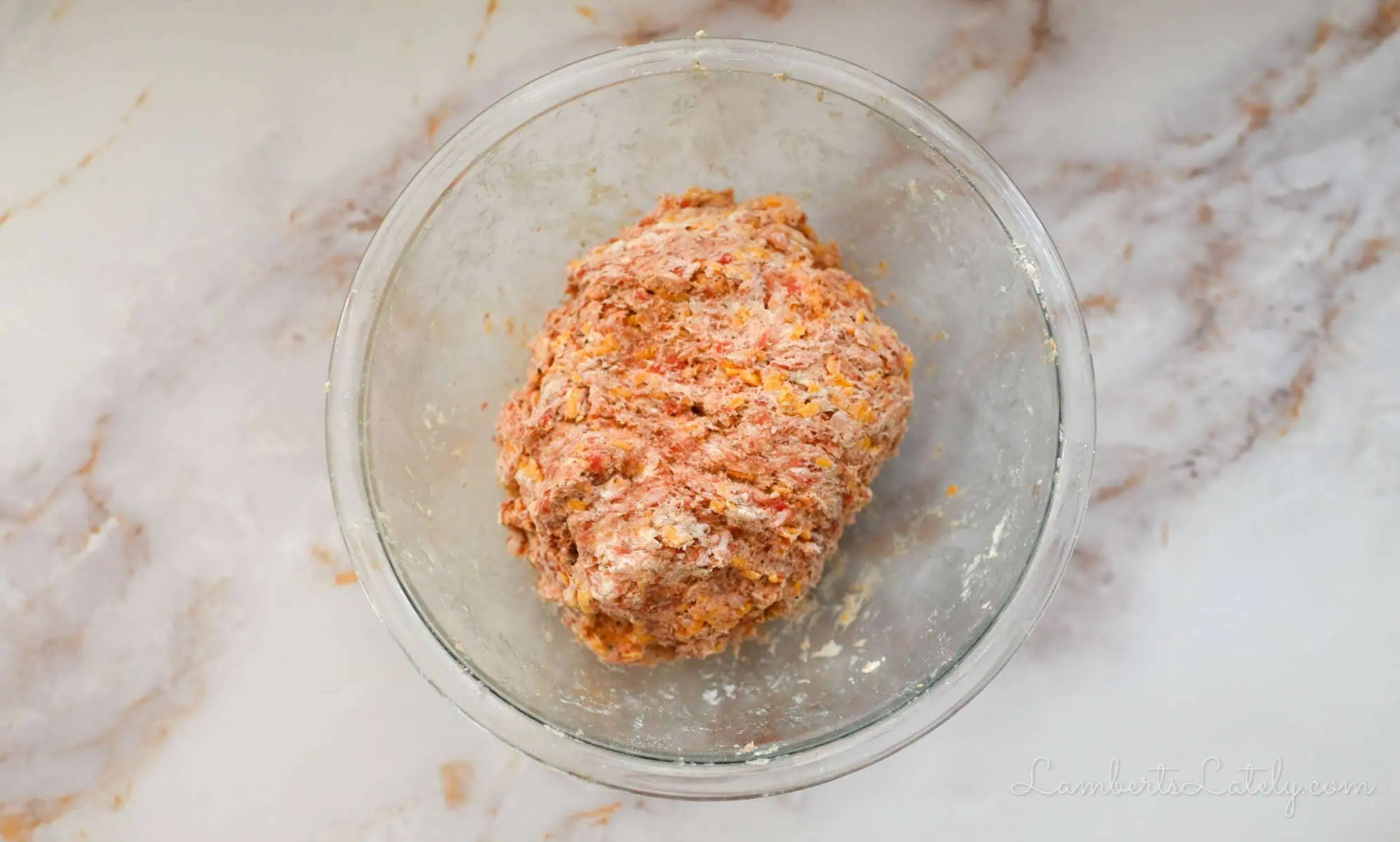 sausage ball dough in a glass bowl.