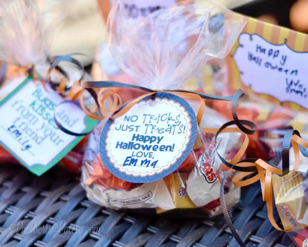 round halloween gift tag on a bag of candy.