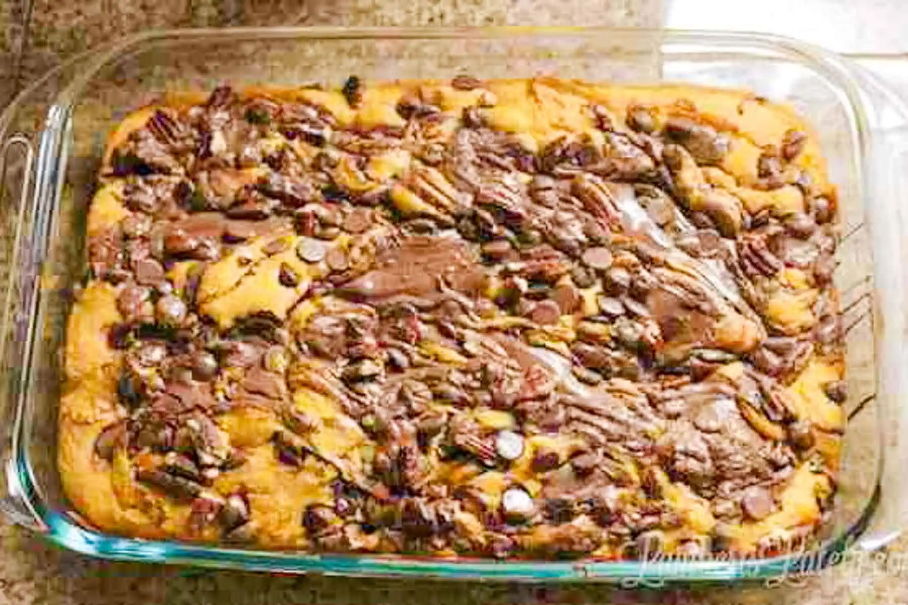 baked pumpkin earthquake cake in a baking dish.