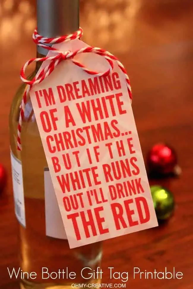 wine bottle gift tag on a bottle of wine.
