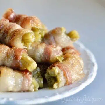 bacon wrapped green beans on a plate