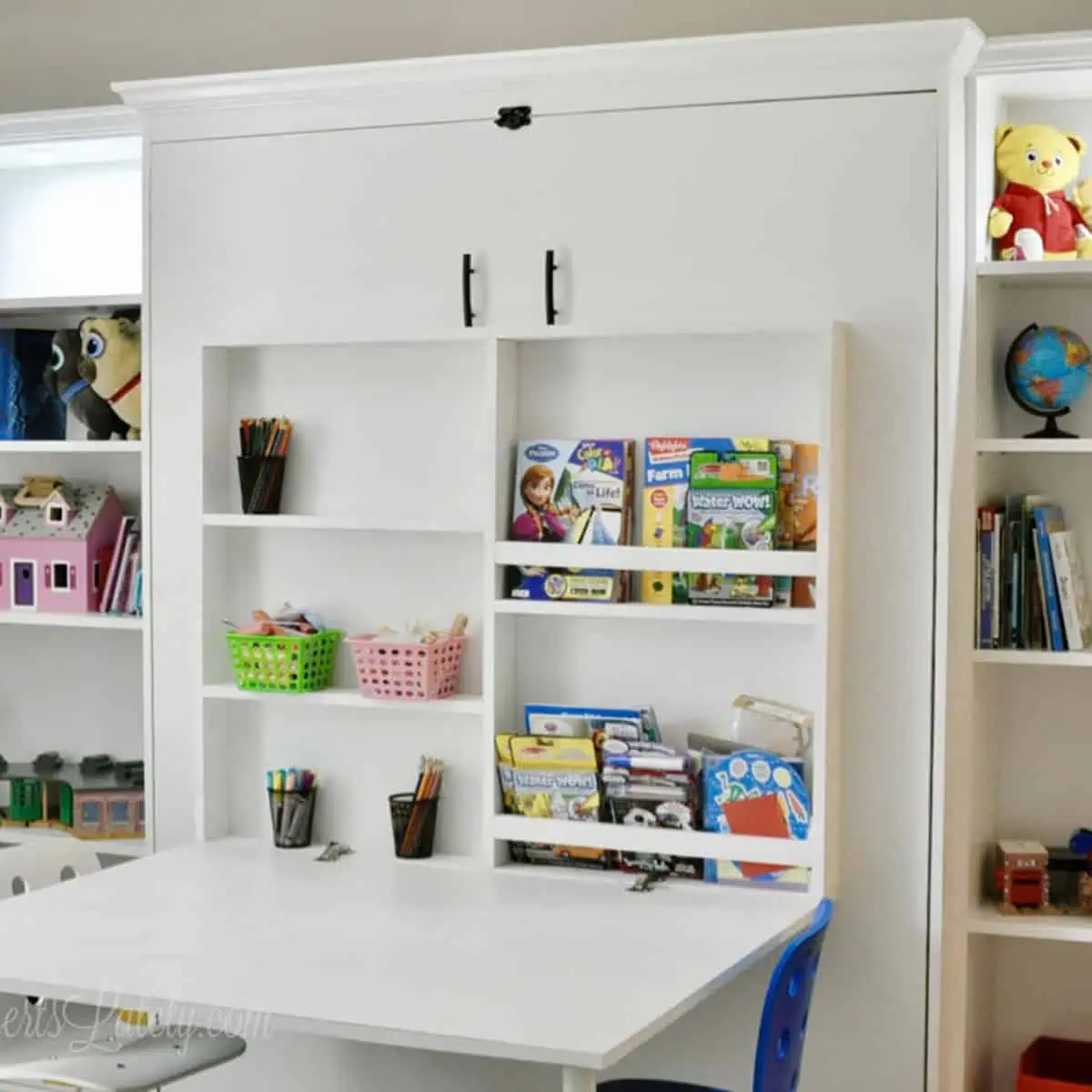 diy murphy bed with fold out desk and ikea billy bookcases.