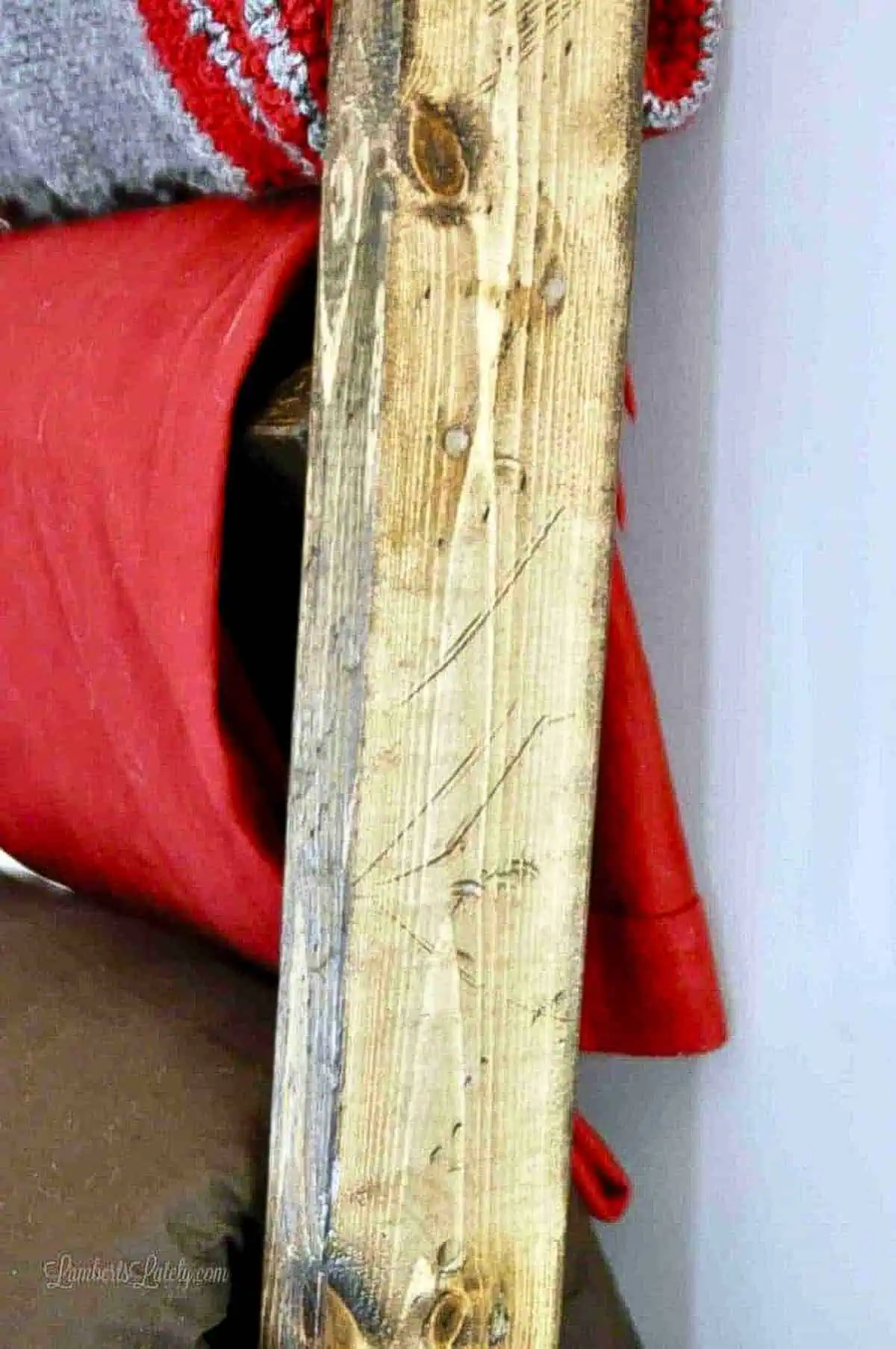 close up of distressing on blanket ladder's side.