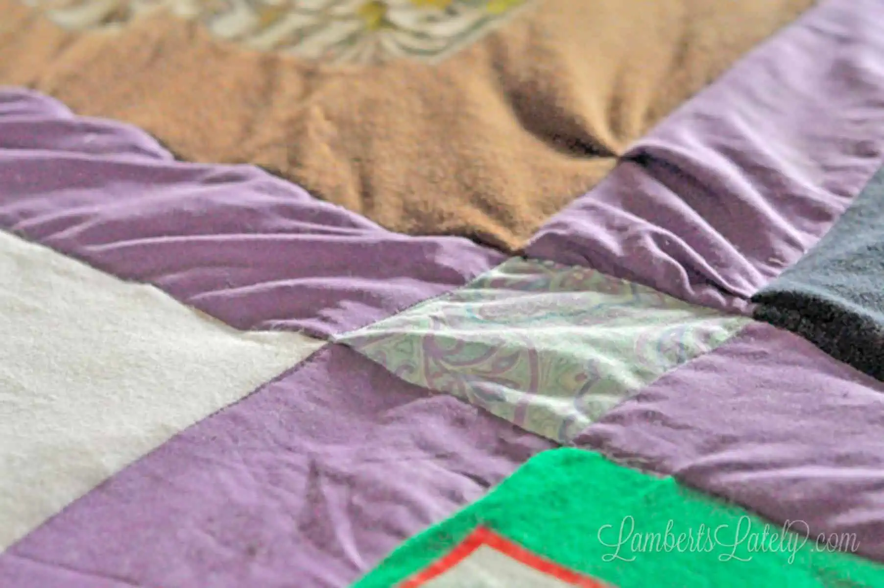close up of squares in a quilt.
