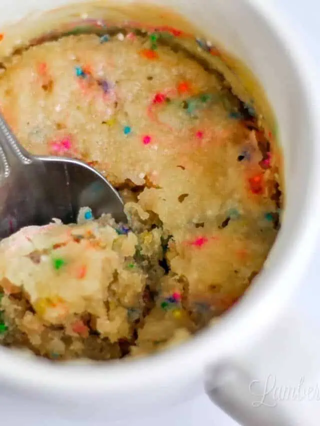 mug cake with a spoon in it.