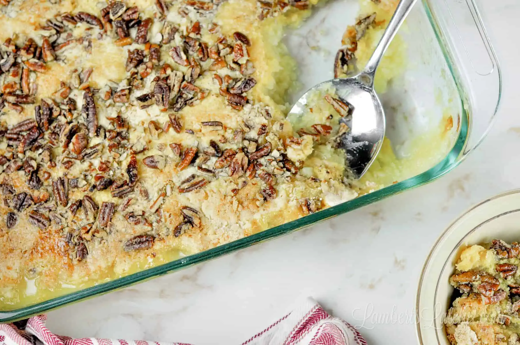 glass baking dish of pineapple dump cake.