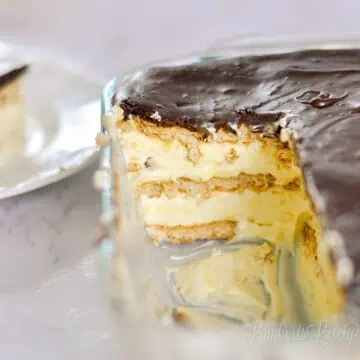 pieces of no bake chocolate eclair cake removed from a baking dish.