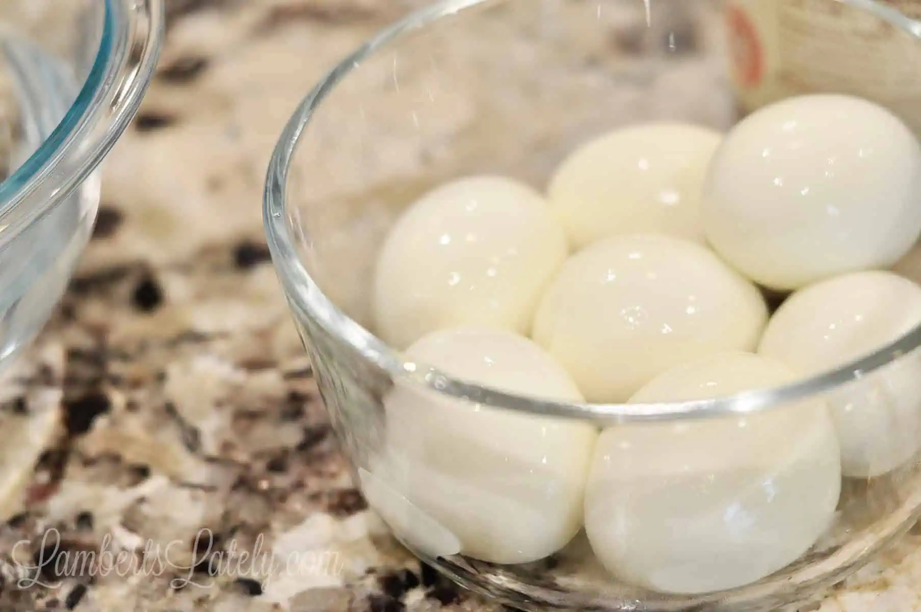 hard boiled eggs in a glass bowl.