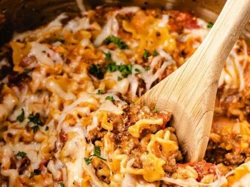 spoon in lasagna in an instant pot.