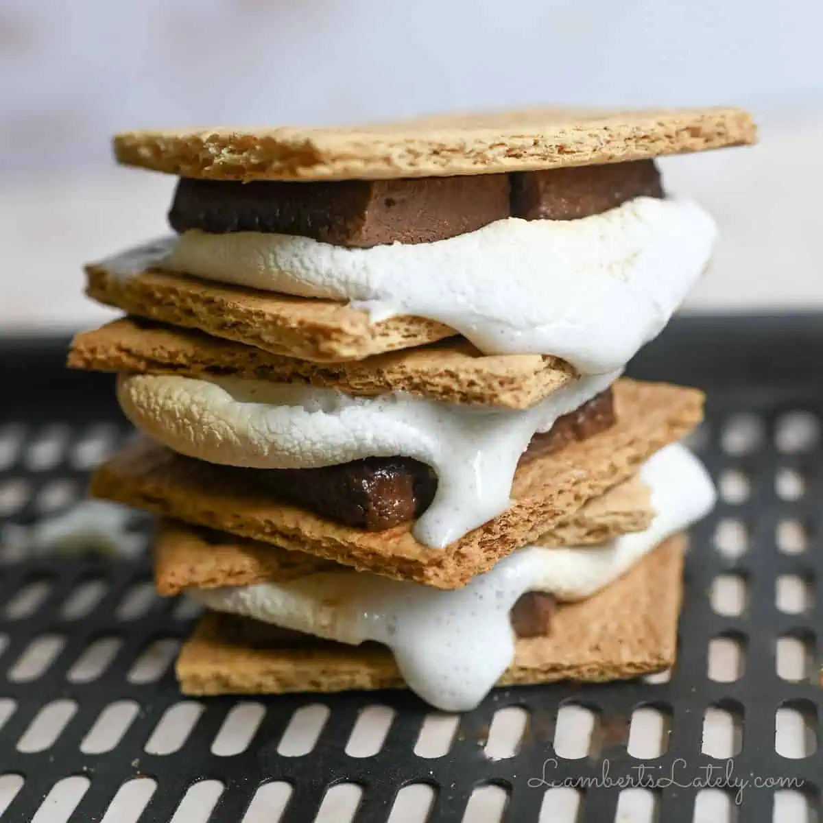 stack of s'mores on an air fryer pan.