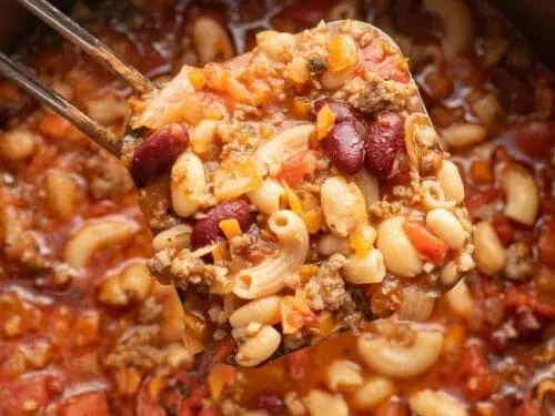 pasta e fajioli in a ladle.