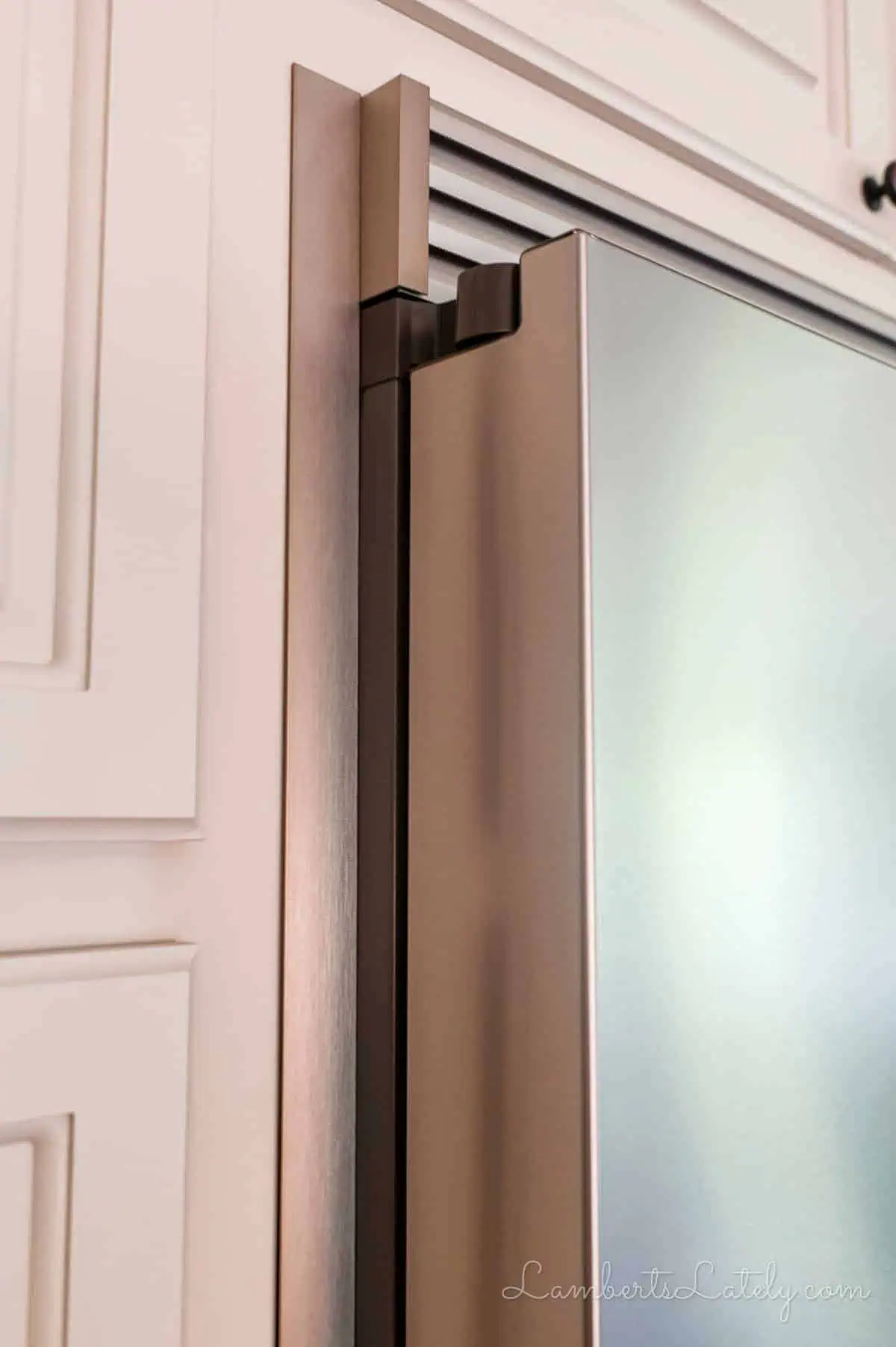 side of a refrigerator with built-in trim.
