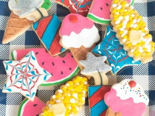 decorated 4th of july sugar cookies on a plate.