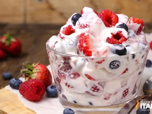 summer berry salad in a large trifle bowl.