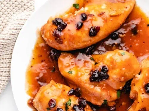 cranberry chicken on a plate.