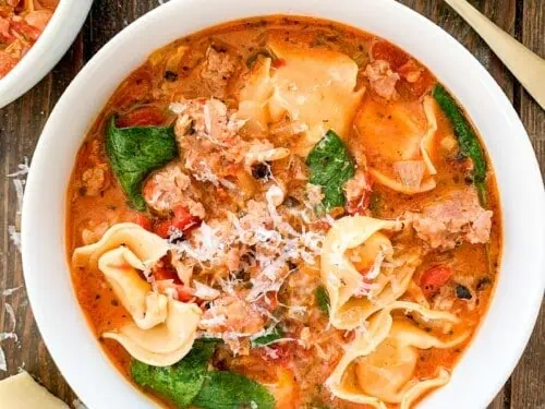 creamy tortellini soup in a bowl.