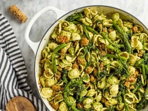 sausage pesto pasta in a baking dish.