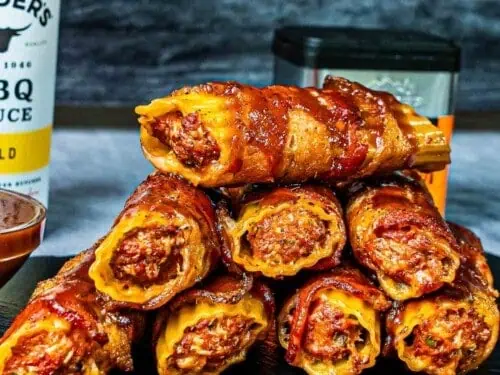 smoked shotgun shell appetizer stacked on a plate.