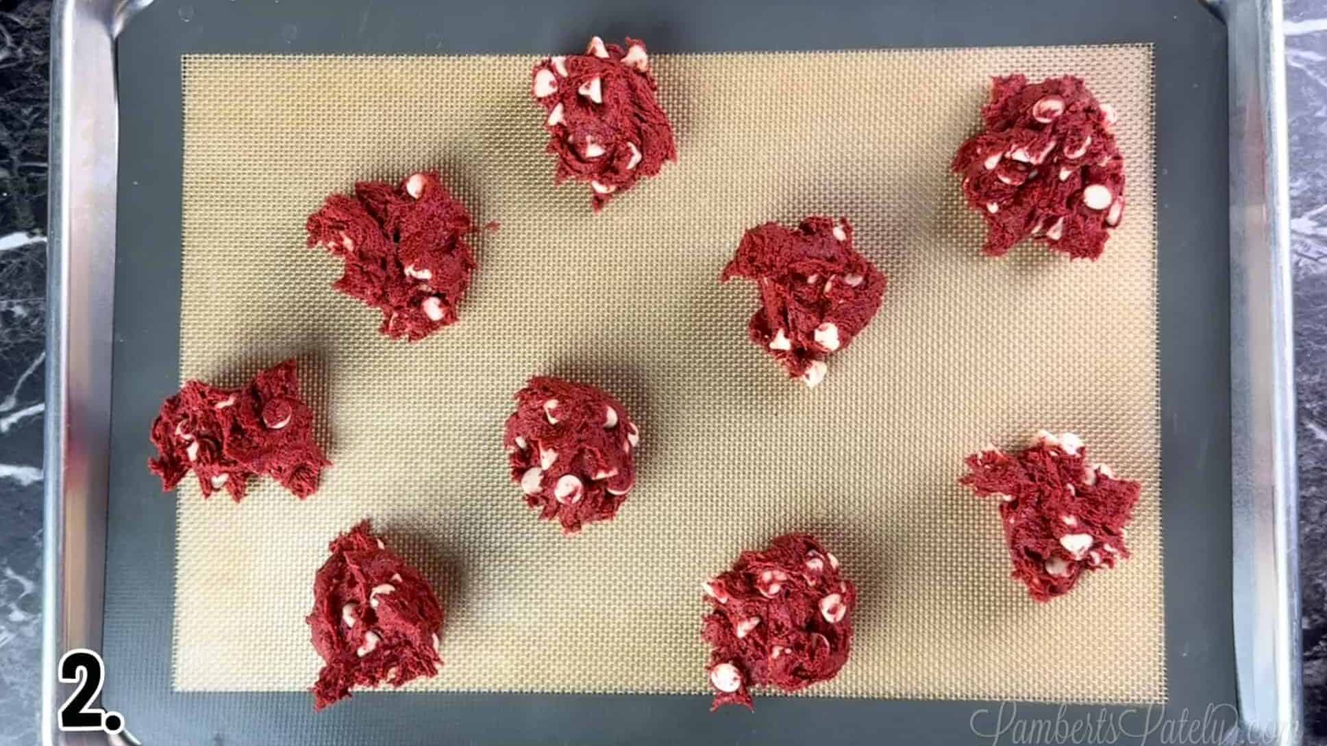 cookie dough on a baking sheet.