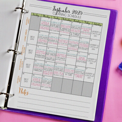 cleaning calendar in a notebook.