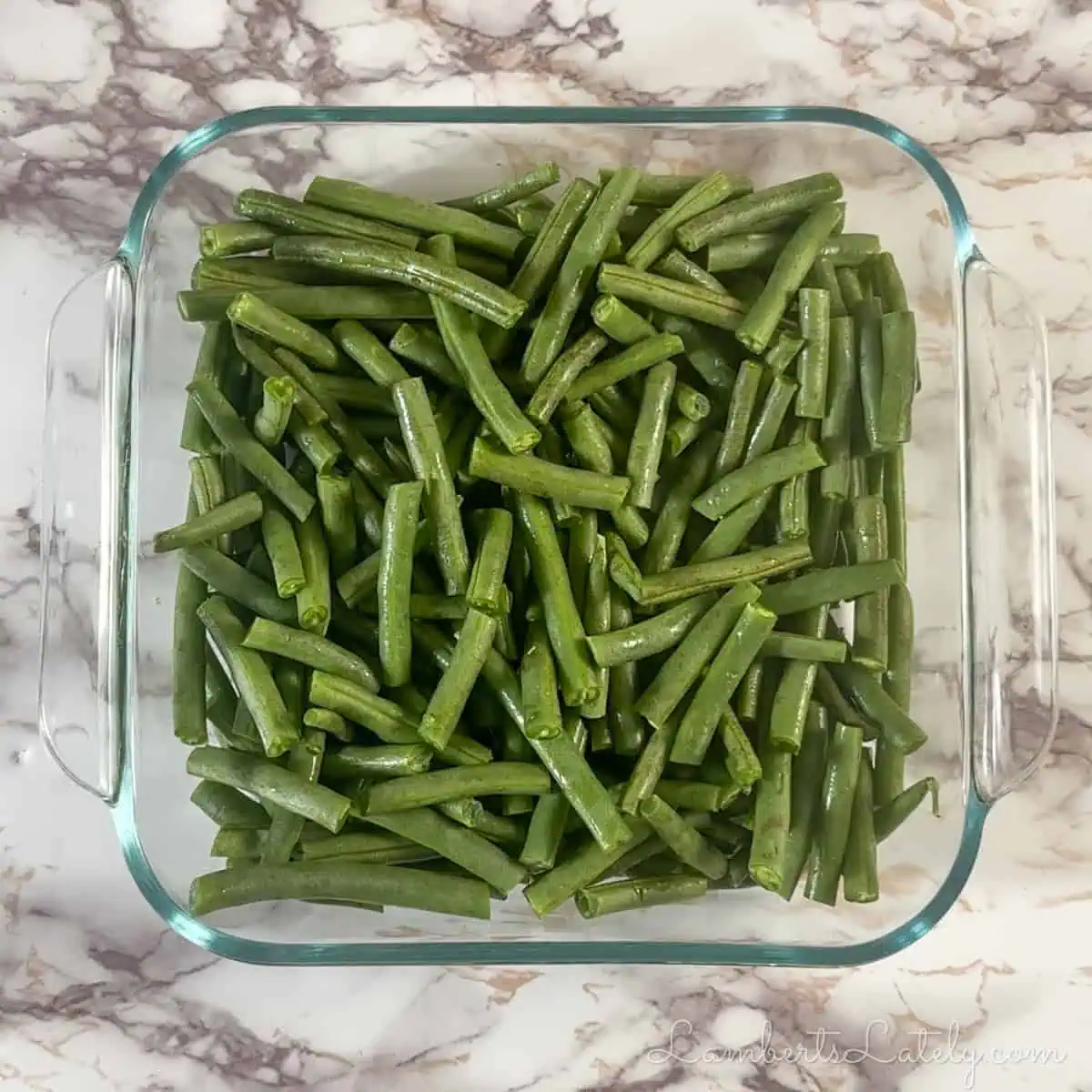 green beans in a glass baking dish.