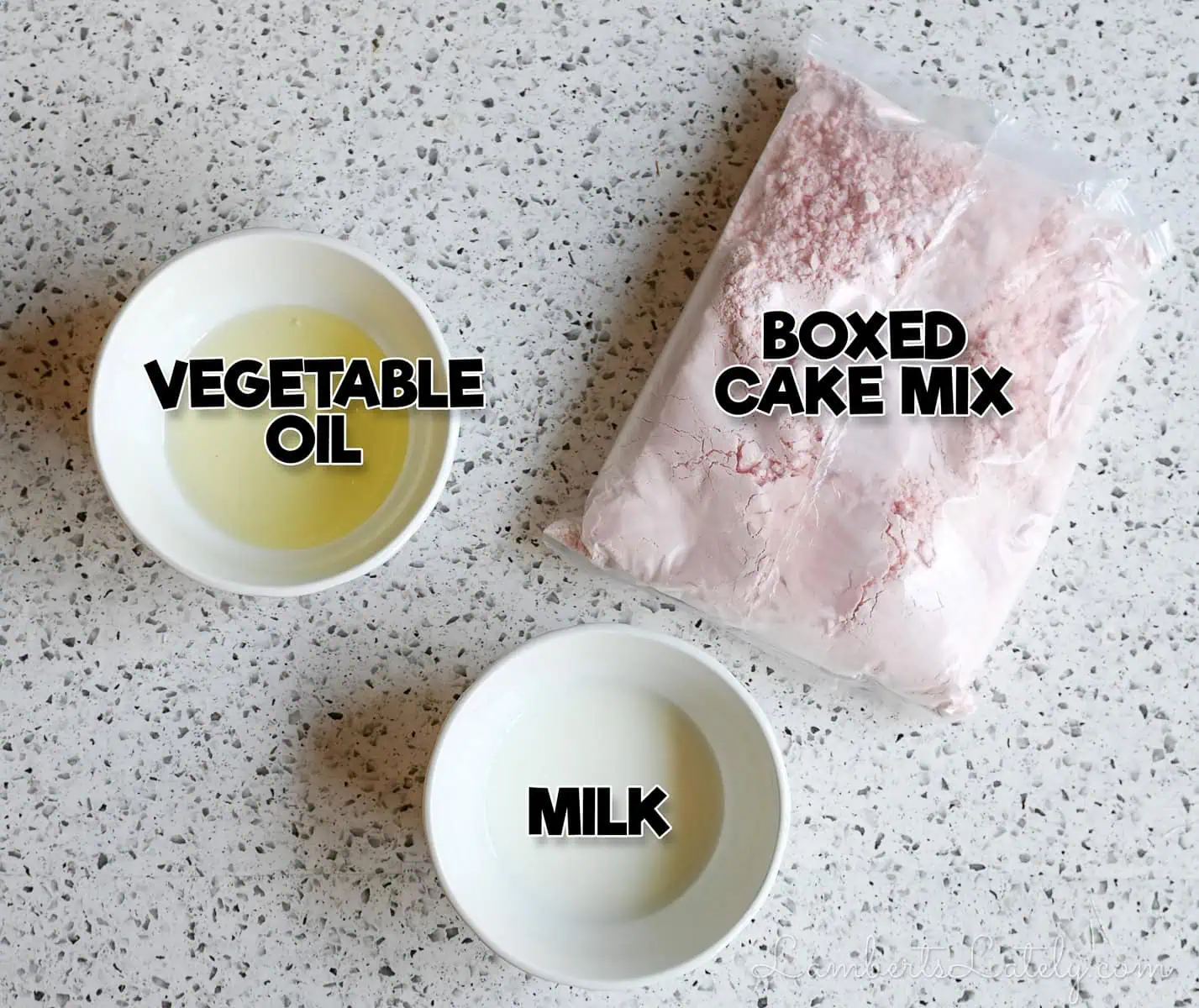 ingredients for a mug cake; cake mix, oil, and milk.