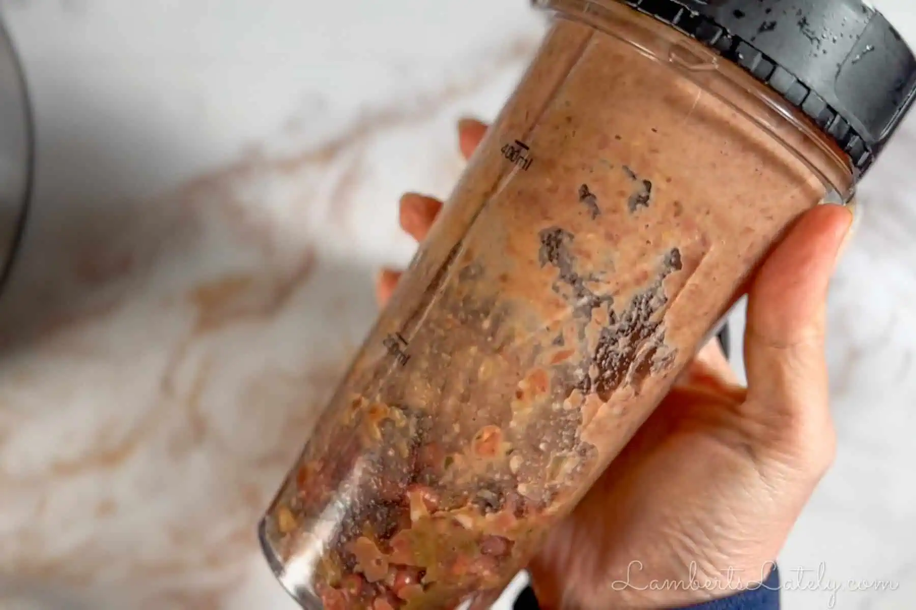 container of pureed red beans.