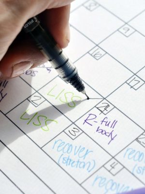crossing off an item on a calendar.