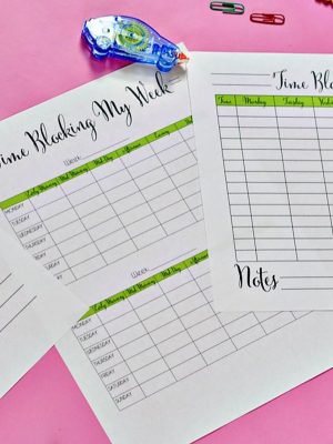 time blocking printables spread on a desk.