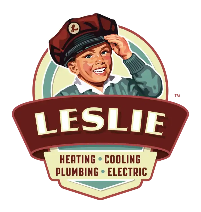 Smiling child in a cap above a banner reading "Leslie" with text below: "Heating • Cooling • Plumbing • Electric.
