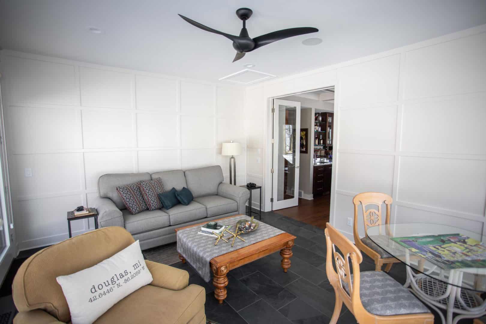 Cozy living room with modern decor and comfortable seating, perfect for family gatherings and relaxa.