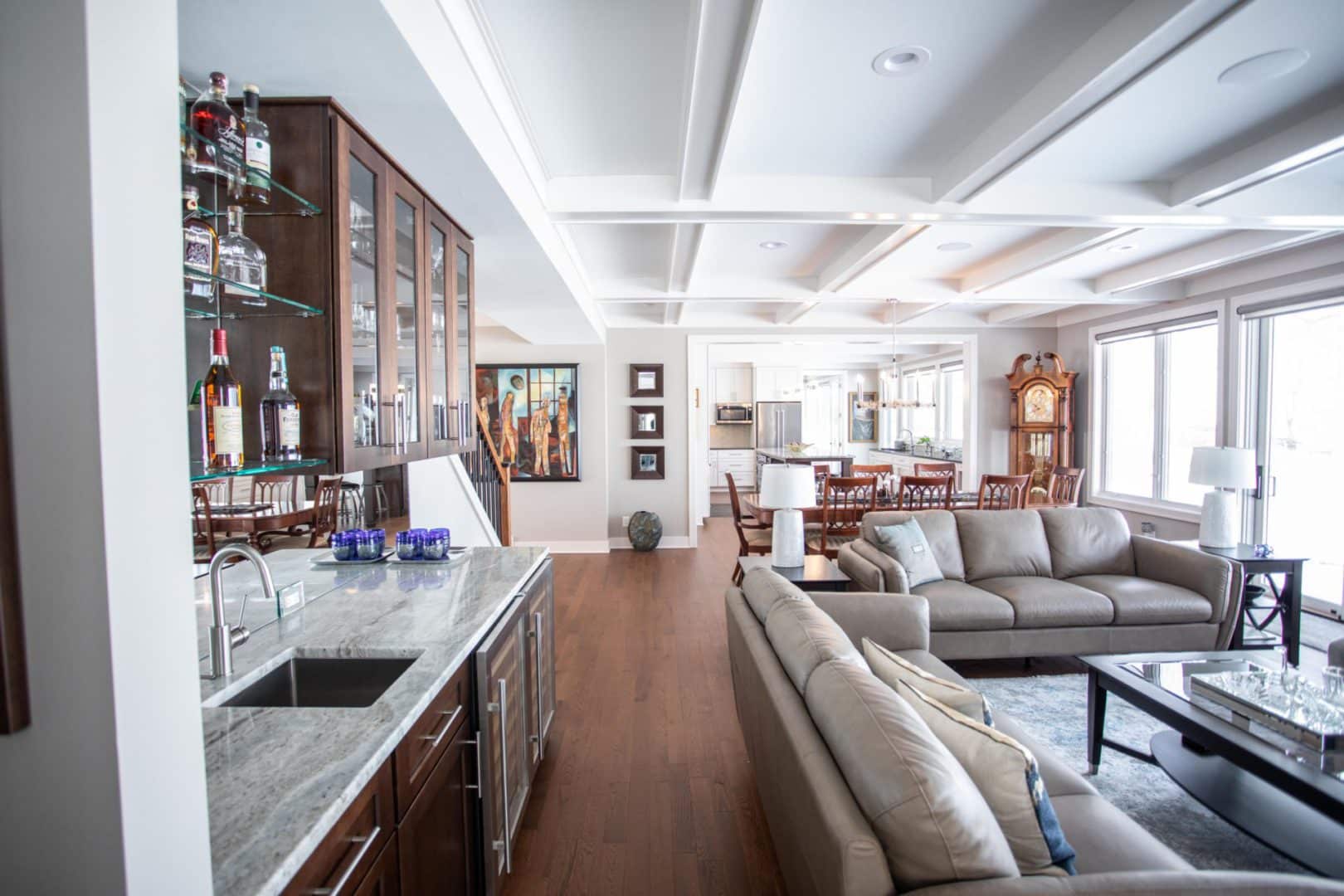 Livingston Homes modern living room with open floor plan, stylish furniture, and natural light.