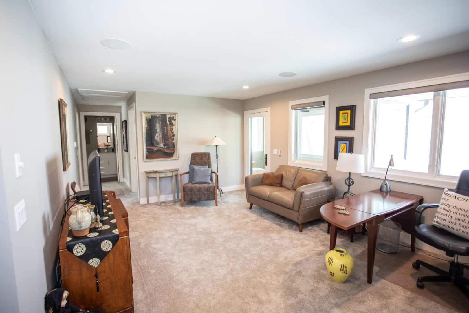 Livingston Homes living room with cozy seating and modern decor.