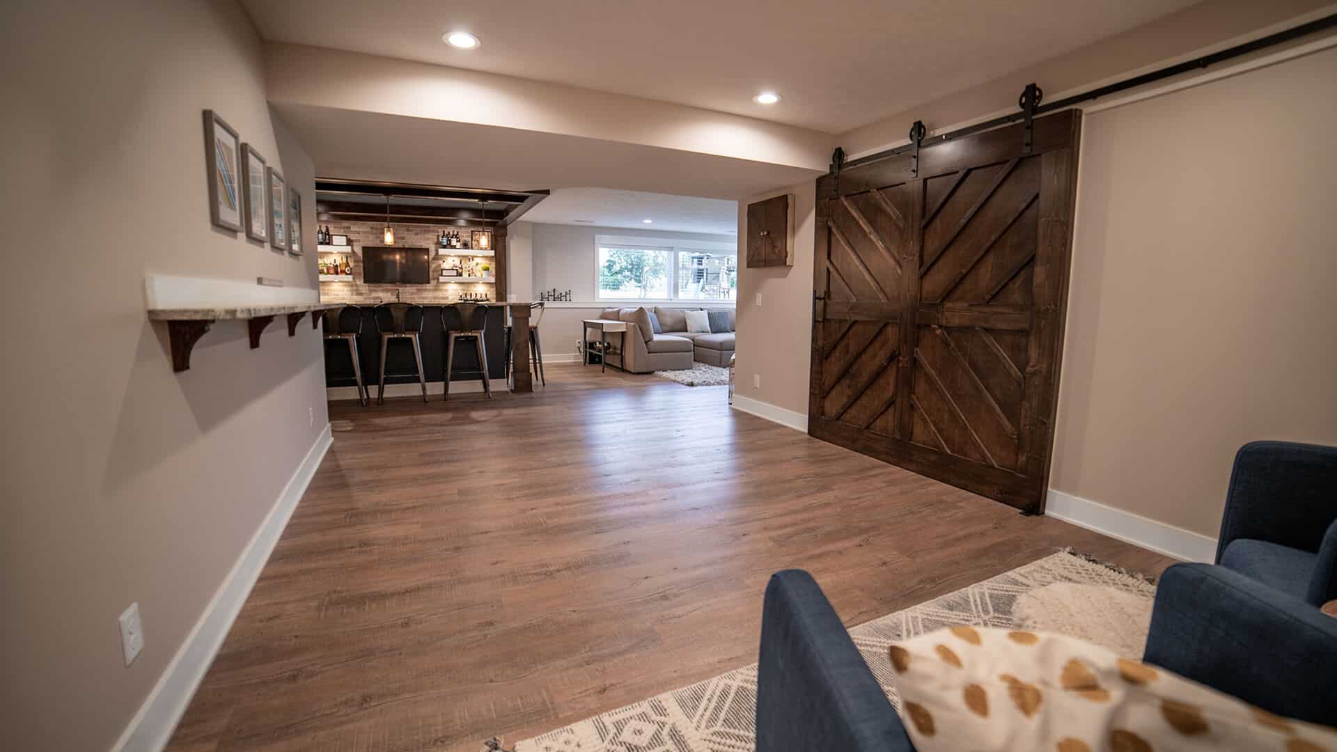 Spacious living room with modern decor and hardwood flooring at Livingston Homes.